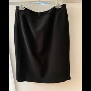 Black suit slim skirt, simple waist back invisible zip, back slit.